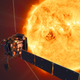 The cubic Solar Orbiter (bottom left) peers at the Sun (top right) in this artist's impression.